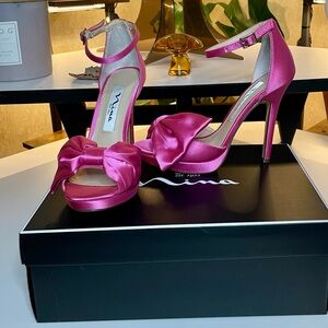 Nina flosie-ys in color ultra pink crystal in satin. Never worn new in box